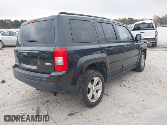 2014 Jeep Patriot Latitude with VIN 1C4NJRFB3ED551622, listed as a IAAI auction lot 40917179 with 109,856 mi miles. Bid and sale history available at carsss.com. Image 4.