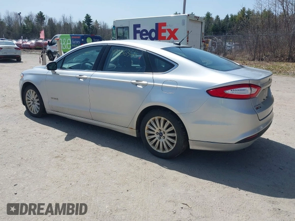 2013 Ford Fusion SE Hybrid with VIN 3FA6P0LU7DR196888, listed as a IAAI auction lot 42156366 with 393,358 mi miles. Bid and sale history available at carsss.com. Image 3.