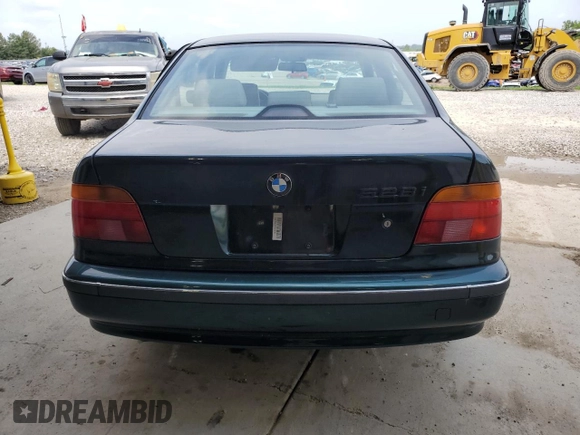 1997 BMW 5 Series 528iA with VIN WBADD632XVBW10342, listed as a Copart auction lot 57026784 with 102,115 mi miles and Salvage Title. Bid and sale history available at carsss.com. Image 6.