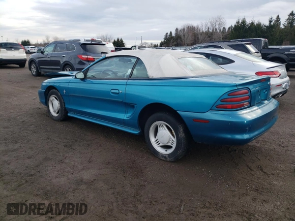 1994 Ford Mustang with VIN 1FALP4444RF169919, listed as a Copart auction lot 86349994 with 273,020 mi miles and Salvage title. Bid and sale history available at DreamBid. Image 2.