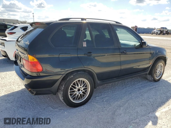 2002 BMW X5 3.0i with VIN 5UXFA53532LP39066, listed as a Copart auction lot 77736044 with 0 mi miles and Salvage Title. Bid and sale history available at carsss.com. Image 3.