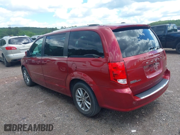2014 Dodge Grand Caravan SXT with VIN 2C4RDGCG4ER366537, listed as a IAAI auction lot 42148032 with 126,531 mi miles and . Bid and sale history available at DreamBid. Image 3.
