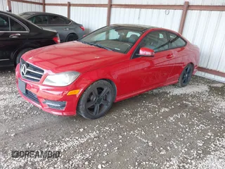 2014 Mercedes-Benz C-Class C 250 with VIN WDDGJ4HB8EG292493, listed as a IAAI auction lot 42032308 with 117,183 mi miles. Bid and sale history available at carsss.com. Image 2.