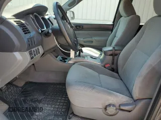 2010 Toyota Tacoma PreRunner with VIN 5TEJU4GNXAZ693226, listed as a Copart auction lot 54715525 with 176,874 mi miles and Salvage Title. Bid and sale history available at DreamBid. Image 7.