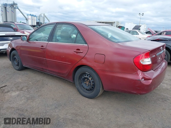 2004 Toyota Camry LE with VIN 4T1BE32K84U307551, listed as a IAAI auction lot 42054571 with 115,513 mi miles. Bid and sale history available at carsss.com. Image 3.