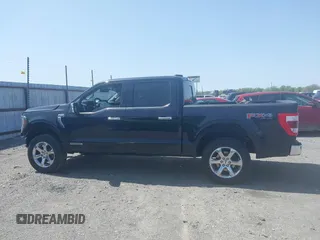2021 Ford F-150 XL with VIN 1FTFW1ED7MFA77770, listed as a IAAI auction lot 41882929 with 76,099 mi miles and . Bid and sale history available at DreamBid. Image 14.