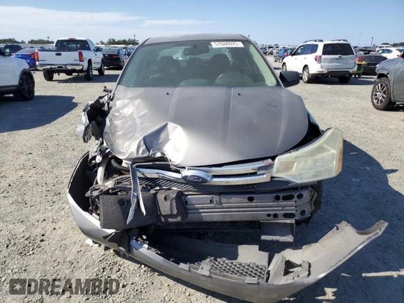 2009 Ford Focus SE z VIN 1FAHP35N59W148326, wystawiony jako Copart lot #57688025 z przebiegiem Nie podano mil oraz Szkoda całkowita • Salvage title. Historia ofert i sprzedaży dostępna na DreamBid. Obrazek 5.