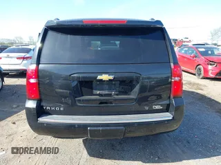 2016 Chevrolet Tahoe LTZ with VIN 1GNSCCKC2GR126687, listed as a IAAI auction lot 41952725 with 202,016 mi miles and . Bid and sale history available at DreamBid. Image 16.