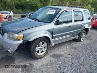 2007 Ford Escape Hybrid z VIN 1FMCU59HX7KB25010, wystawiony jako IAAI lot #42159589 z przebiegiem 217 254 mil mil oraz . Historia ofert i sprzedaży dostępna na DreamBid. Obrazek 2.