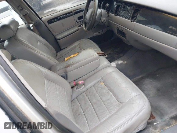 1998 Lincoln Town Car Signature with VIN 1LNFM82WXWY659028, listed as a IAAI auction lot 42265774 with 164,400 mi miles and . Bid and sale history available at DreamBid. Image 5.