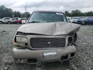 2000 Cadillac Escalade z VIN 1GYEK13R5YR112858, wystawiony jako Copart lot #71651294 z przebiegiem 228 689 mil mil oraz Szkody całkowita. Historia ofert i sprzedaży dostępna na DreamBid. Obrazek 5.