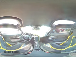2018 McLaren 720S z VIN SBM14DCA2JW000849, wystawiony jako Copart lot #71075974 z przebiegiem Nie podano mil oraz Szkody całkowita. Historia ofert i sprzedaży dostępna na DreamBid. Obrazek 13.