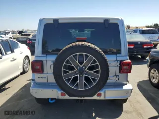 2024 Jeep Wrangler 4xe High Altitude with VIN 1C4RJXU67RW140908, listed as a Copart auction lot 70006384 with 4,273 mi miles and Salvage Title. Bid and sale history available at carsss.com. Image 6.
