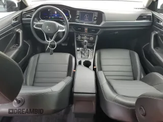 2022 Volkswagen Jetta SE with VIN 3VWEM7BU8NM010697, listed as a Copart auction lot 56521505 with 9,110 mi miles and Salvage title. Bid and sale history available at DreamBid. Image 8.