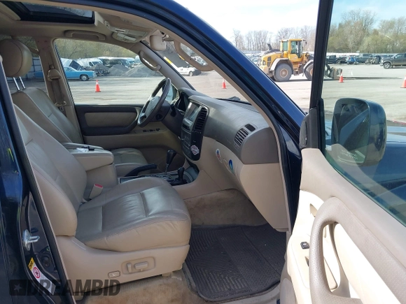 2004 Toyota Land Cruiser with VIN JTEHT05J942054673, listed as a IAAI auction lot 42112791 with 206,784 mi miles. Bid and sale history available at carsss.com. Image 5.