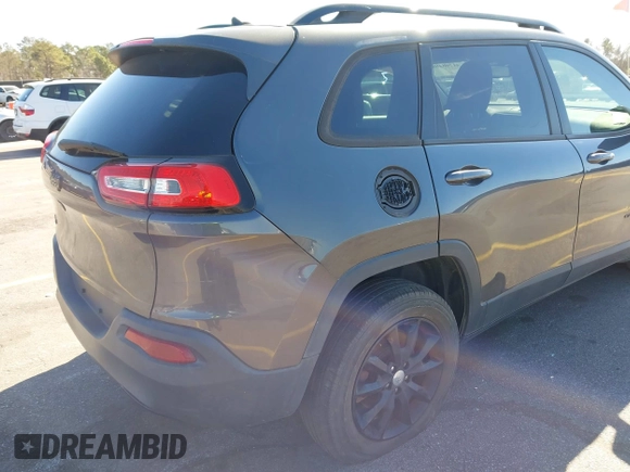 2014 Jeep Cherokee Latitude with VIN 1C4PJMCS3EW298340, listed as a IAAI auction lot 41708488 with 217,438 mi miles and . Bid and sale history available at DreamBid. Image 17.