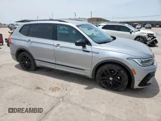 2022 Volkswagen Tiguan SE R-Line Black with VIN 3VVCB7AX5NM016910, listed as a Copart auction lot 57120005 with 54,812 mi miles and Salvage title. Bid and sale history available at DreamBid. Image 4.