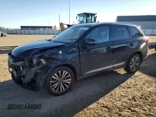 2020 Mitsubishi Outlander ES z VIN JA4AZ2A36LZ614463, wystawiony jako Copart lot #79487154 z przebiegiem 74 811 mil mil oraz Szkoda całkowita • Salvage title. Historia ofert i sprzedaży dostępna na DreamBid. Obrazek 1.