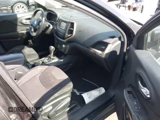 2015 Jeep Cherokee Latitude with VIN 1C4PJLCB9FW627909, listed as a IAAI auction lot 42034667 with 131,739 mi miles and . Bid and sale history available at carsss.com. Image 5.