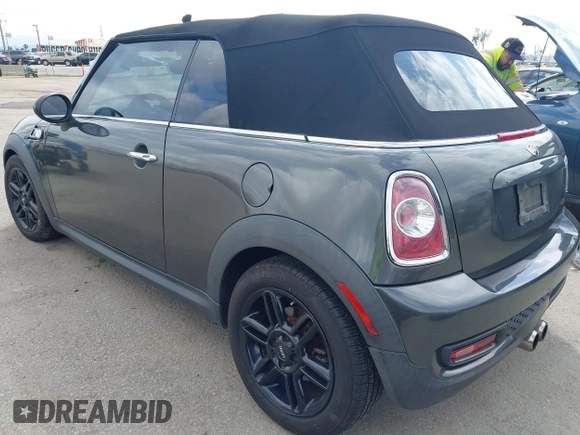 2012 MINI Convertible S with VIN WMWZP3C54CT250689, listed as a IAAI auction lot 41928624 with 126,442 mi miles and . Bid and sale history available at DreamBid. Image 3.