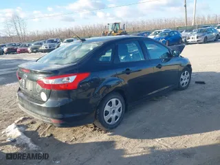 2014 Ford Focus S with VIN 1FADP3E26EL410628, listed as a IAAI auction lot 41590044 with 88,602 mi miles. Bid and sale history available at carsss.com. Image 4.