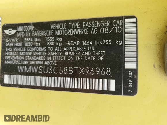 2011 MINI Hardtop with VIN WMWSU3C58BTX96968, listed as a Copart auction lot 62560915 with 88,616 mi miles and Salvage title. Bid and sale history available at DreamBid. Image 12.