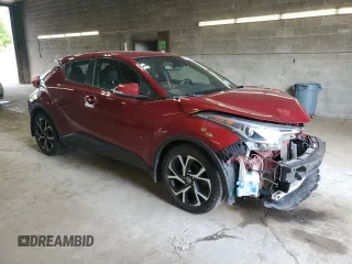 2018 Toyota C-HR XLE with VIN NMTKHMBX7JR032119, listed as a Copart auction lot 61007975 with 100,093 mi miles and Salvage title. Bid and sale history available at DreamBid. Image 4.