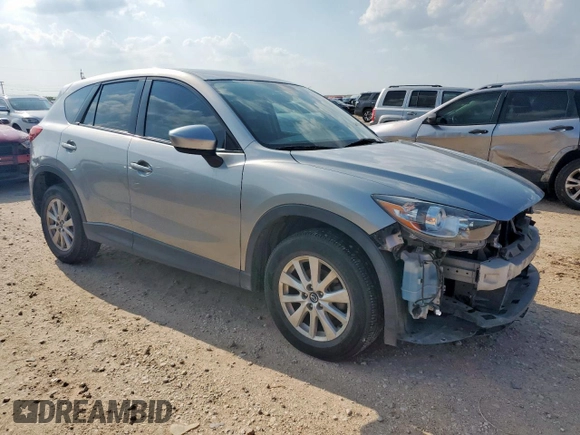 2013 Mazda CX-5 Sport with VIN JM3KE2BE5D0129797, listed as a Copart auction lot 58051185 with 200,712 mi miles and Salvage title. Bid and sale history available at DreamBid. Image 4.