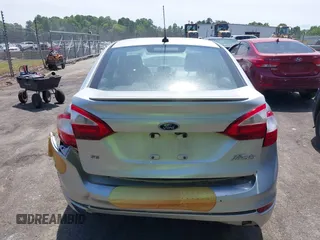 2019 Ford Fiesta SE z VIN 3FADP4BJ0KM133096, wystawiony jako IAAI lot #42204601 z przebiegiem 108 904 mil mil oraz . Historia ofert i sprzedaży dostępna na DreamBid. Obrazek 16.