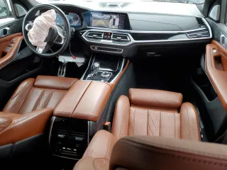 2020 BMW X7 M50i z VIN 5UXCX6C04L9B99921, wystawiony jako Copart lot #56665755 z przebiegiem 63 328 mil mil oraz Szkoda całkowita • Salvage title. Historia ofert i sprzedaży dostępna na DreamBid. Obrazek 8.