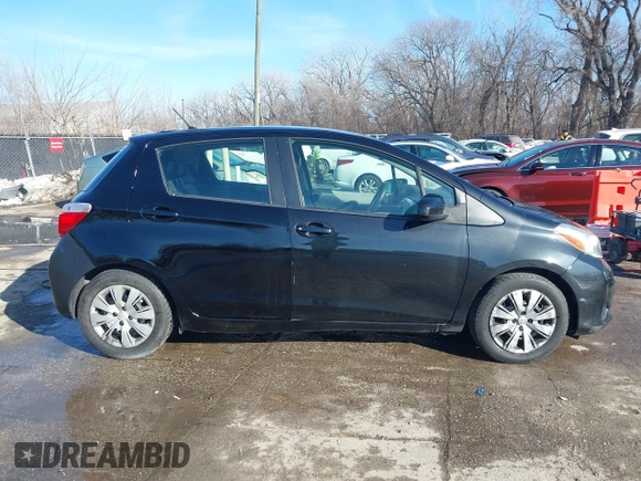 2012 Toyota Yaris L with VIN JTDKTUD31CD500337, listed as a IAAI auction lot 41410723 with 130,881 mi miles. Bid and sale history available at carsss.com. Image 13.