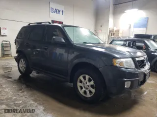 2010 Mazda Tribute Touring with VIN 4F2CY9C70AKM07812, listed as a Copart auction lot 42432055 with 132,562 mi miles and Salvage Title. Bid and sale history available at carsss.com. Image 4.