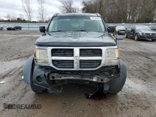 2007 Dodge Nitro SXT z VIN 1D8GU28K07W555205, wystawiony jako Copart lot #81165584 z przebiegiem 206 499 mil mil oraz Szkoda całkowita • Salvage title. Historia ofert i sprzedaży dostępna na DreamBid. Obrazek 5.