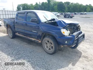 2013 Toyota Tacoma PreRunner z VIN 5TFJU4GN8DX043709, wystawiony jako IAAI lot #42143731 z przebiegiem 185 156 mil mil oraz . Historia ofert i sprzedaży dostępna na DreamBid. Obrazek 1.