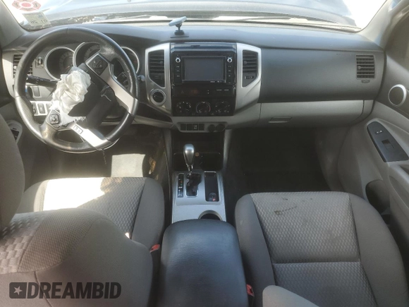 2014 Toyota Tacoma with VIN 3TMLU4EN2EM163797, listed as a Copart auction lot 61078805 with 130,748 mi miles and Salvage title. Bid and sale history available at DreamBid. Image 8.