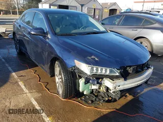 2015 Acura TLX V6 Advance with VIN 19UUB3F74FA009984, listed as a IAAI auction lot 41724728 with 155,841 mi miles. Bid and sale history available at carsss.com. Image 1.