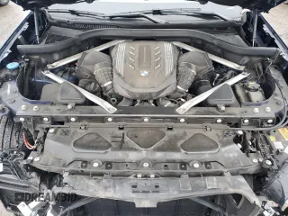 2020 BMW X5 M50i with VIN 5UXJU4C07LLE46002, listed as a Copart auction lot 77853984 with 74,098 mi miles and Salvage Title. Bid and sale history available at DreamBid. Image 12.