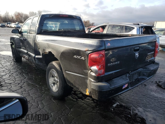 2011 Dodge Dakota z VIN 1D7RW2BK3BS602758, wystawiony jako Copart lot #85288074 z przebiegiem 138 473 mil mil oraz Szkoda całkowita • Salvage title. Historia ofert i sprzedaży dostępna na DreamBid. Obrazek 2.