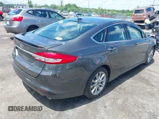2017 Ford Fusion Titanium z VIN 3FA6P0SUXHR184919, wystawiony jako IAAI lot #42258918 z przebiegiem Nie podano mil oraz . Historia ofert i sprzedaży dostępna na DreamBid. Obrazek 4.