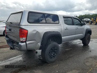 2016 Toyota Tacoma SR5 with VIN 5TFAX5GN3GX073301, listed as a Copart auction lot 71953054 with 148,396 mi miles and Salvage Title. Bid and sale history available at carsss.com. Image 3.