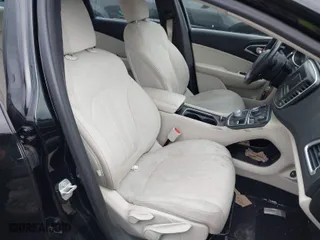 2015 Chrysler 200 Limited with VIN 1C3CCCAB1FN680111, listed as a IAAI auction lot 41943593 with 121,296 mi miles. Bid and sale history available at carsss.com. Image 5.