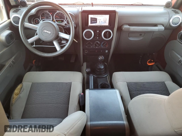 2010 Jeep Wrangler Unlimited Sahara with VIN 1J4BA5H11AL107228, listed as a Copart auction lot 54761705 with 102,816 mi miles and Clean Title. Bid and sale history available at carsss.com. Image 8.