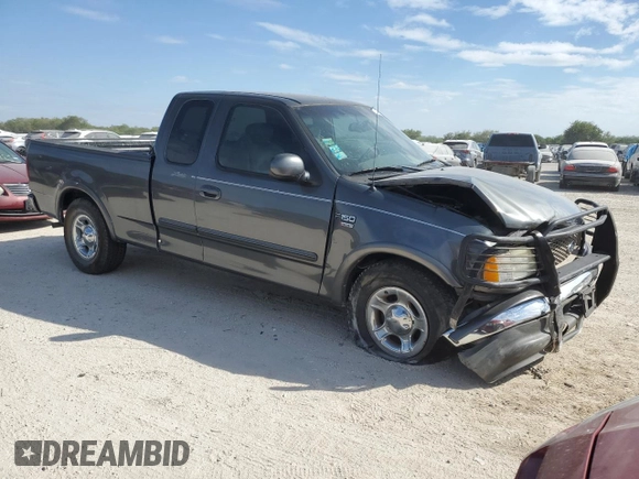 2003 Ford F-150 XL with VIN 1FTRX17L33NB34789, listed as a Copart auction lot 73762304 with 0 mi miles and Salvage Title. Bid and sale history available at carsss.com. Image 4.
