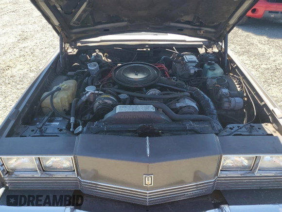 1983 Oldsmobile Toronado with VIN 1G3AZ57Y8DE312949, listed as a Copart auction lot 65228244 with 159,172 mi miles and Salvage Title. Bid and sale history available at DreamBid. Image 11.