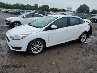 2016 Ford Focus SE with VIN 1FADP3F22GL260860, listed as a Copart auction lot 61085065 with 136,160 mi miles and Salvage title. Bid and sale history available at DreamBid. Image 1.
