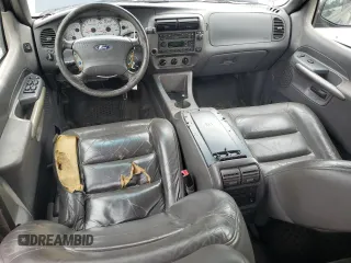 2001 Ford Explorer Sport Trac with VIN 1FMZU67E11UB01604, listed as a Copart auction lot 57581825 with 211,905 mi miles and Salvage title. Bid and sale history available at DreamBid. Image 8.