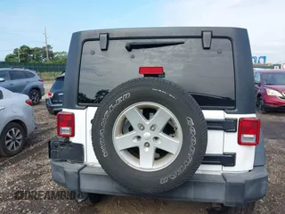 2016 Jeep Wrangler Unlimited Sport z VIN 1C4HJWDG7GL166003, wystawiony jako IAAI lot #42549551 z przebiegiem 96 760 mil mil oraz . Historia ofert i sprzedaży dostępna na DreamBid. Obrazek 16.