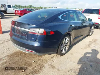 2014 Tesla Model S 60 with VIN 5YJSA1H12EFP39873, listed as a IAAI auction lot 42443414 with 132,773 mi miles and . Bid and sale history available at DreamBid. Image 4.