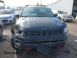 2017 Jeep Compass Trailhawk with VIN 3C4NJDDBXHT657425, listed as a IAAI auction lot 41022289 with 83,003 mi miles and . Bid and sale history available at DreamBid. Image 12.