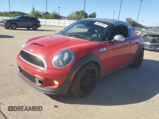 2012 MINI Coupe S z VIN WMWSX3C53CT155140, wystawiony jako Copart lot #75521054 z przebiegiem 65 628 mil mil oraz Szkody całkowita. Historia ofert i sprzedaży dostępna na DreamBid. Obrazek 1.